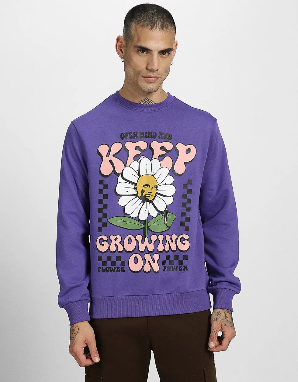 Heres an optimized title with modifiers for the product:

Trendy Purple Sweatshirt with Inspiring Keep Growing Typographic Print