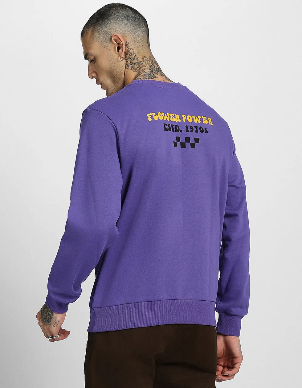 Heres an optimized title with modifiers for the product:

Trendy Purple Sweatshirt with Inspiring Keep Growing Typographic Print